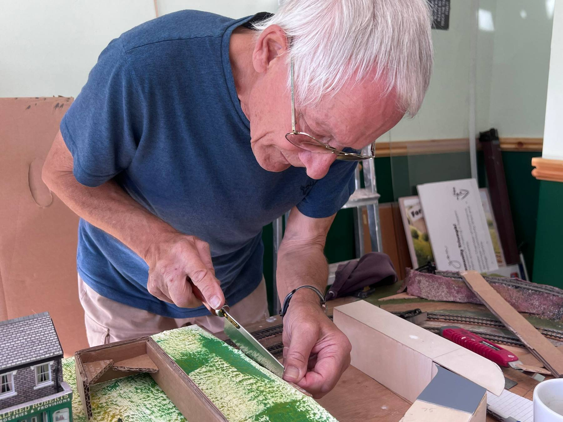 Volunteer at work on a model