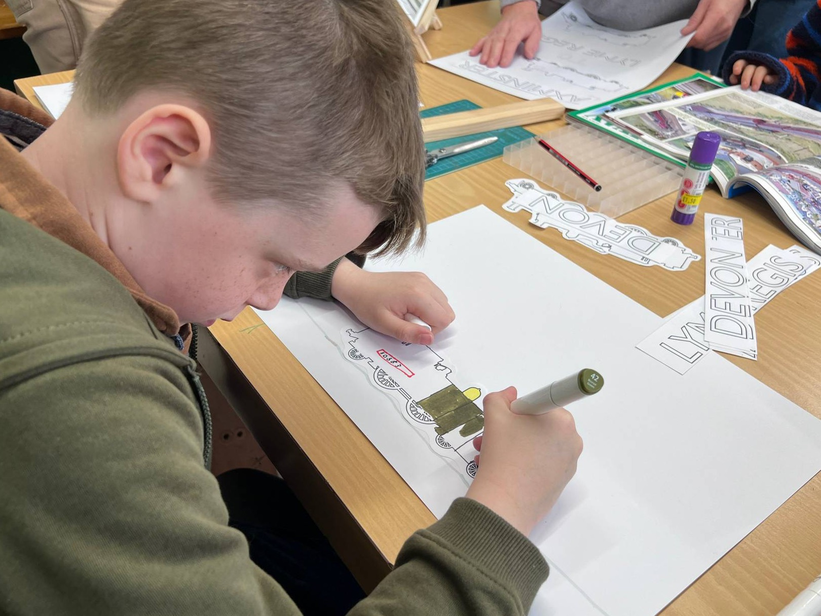 Student at work with schools pack