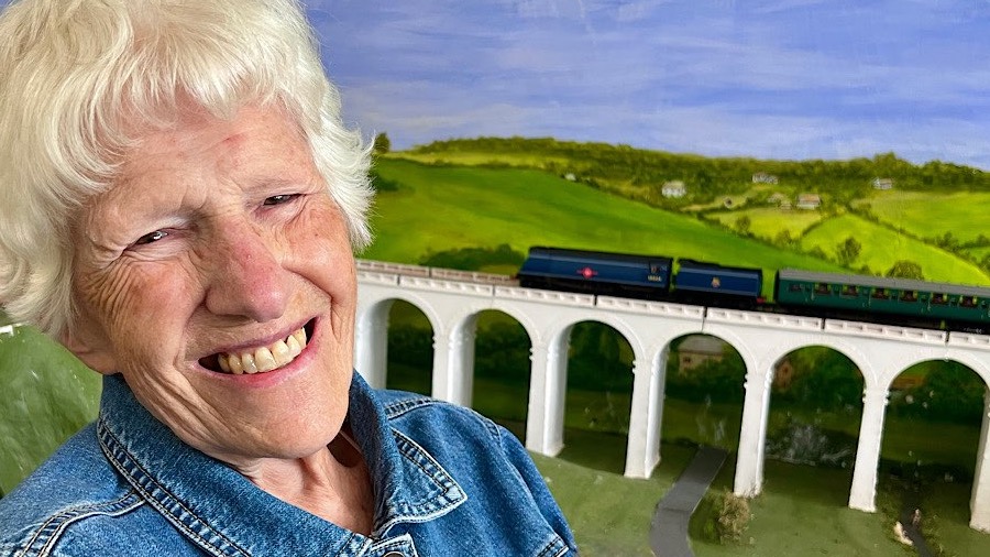 Lady enjoying the model railway