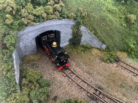 Train emerging from tunnel
